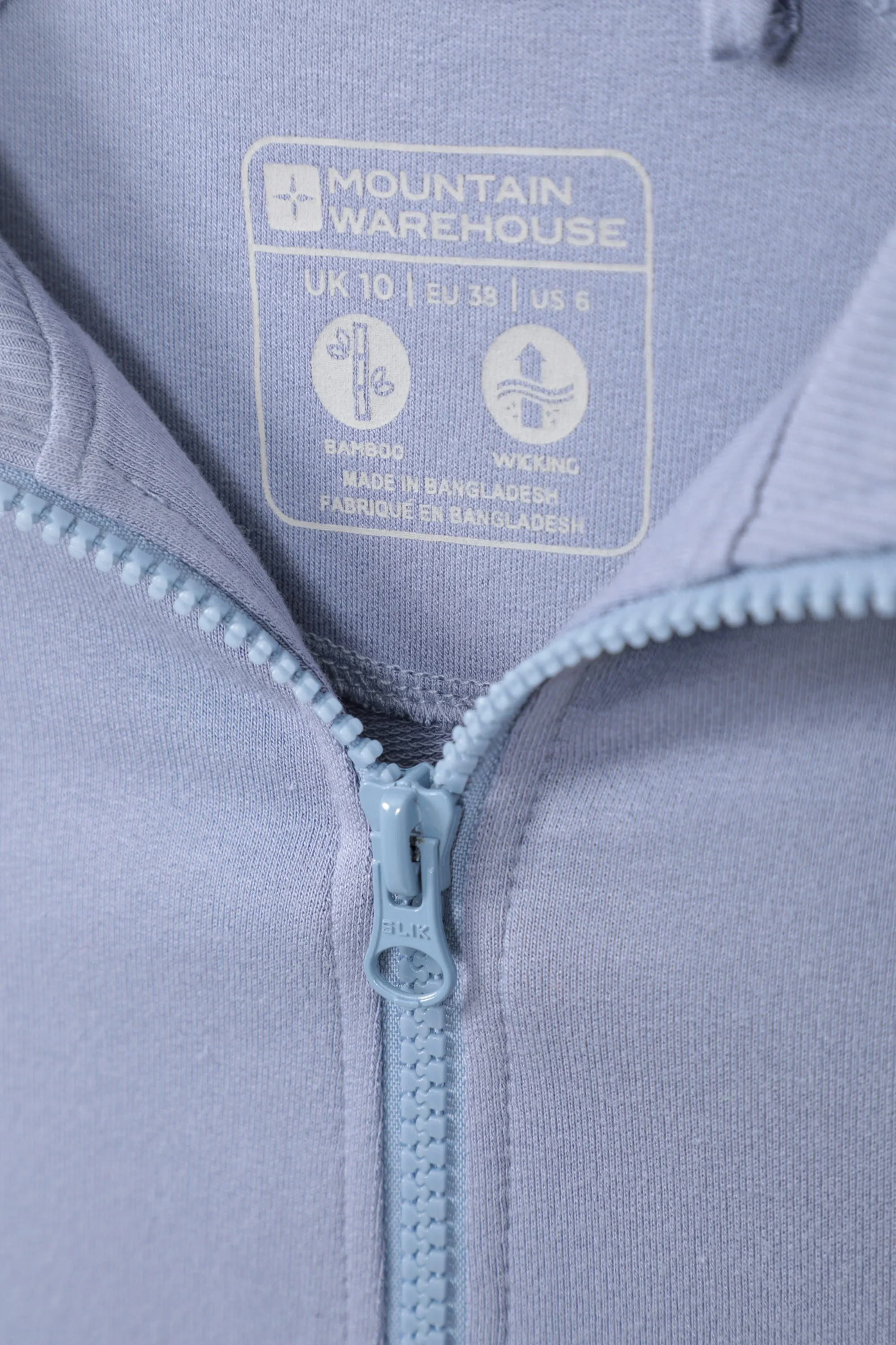 Capa intermedia de bambú con cremallera completa para mujer