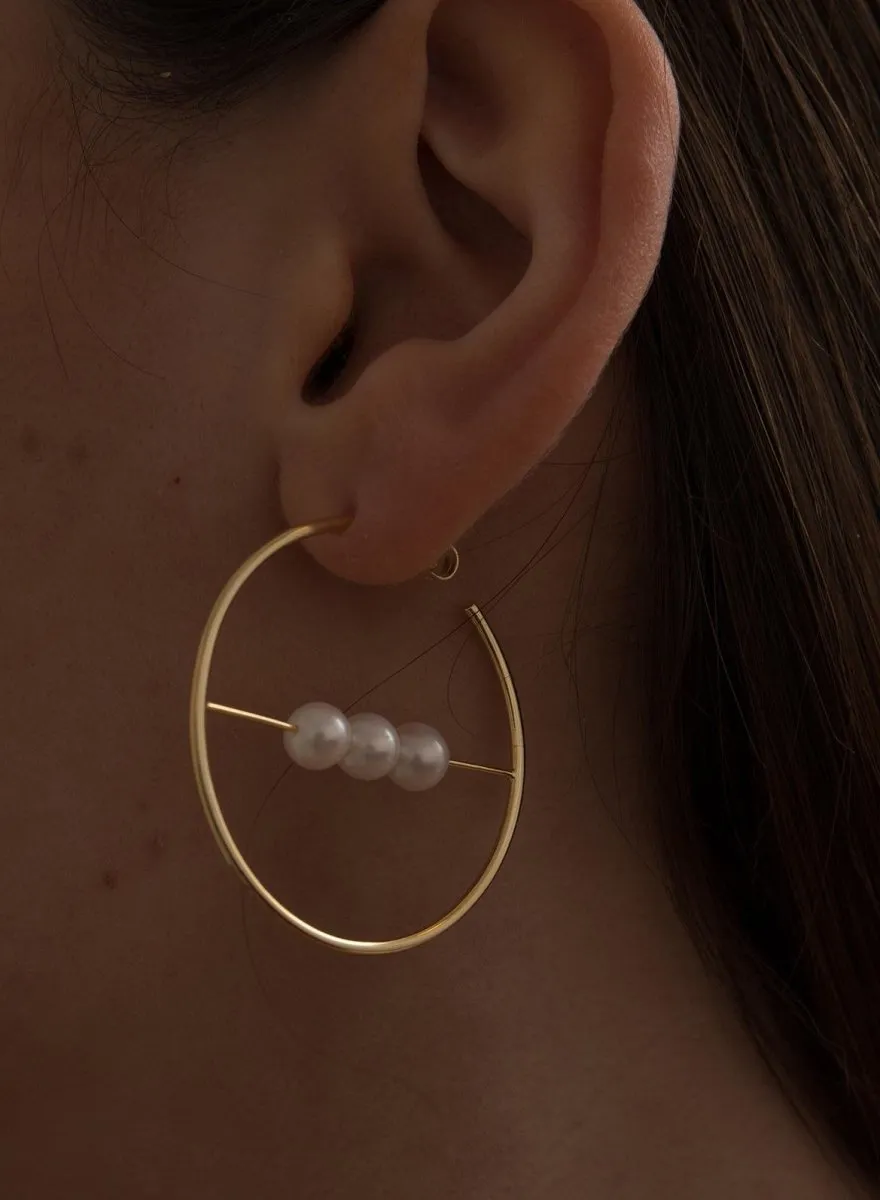 Pendientes aro originales diseo barra central con tres perlas