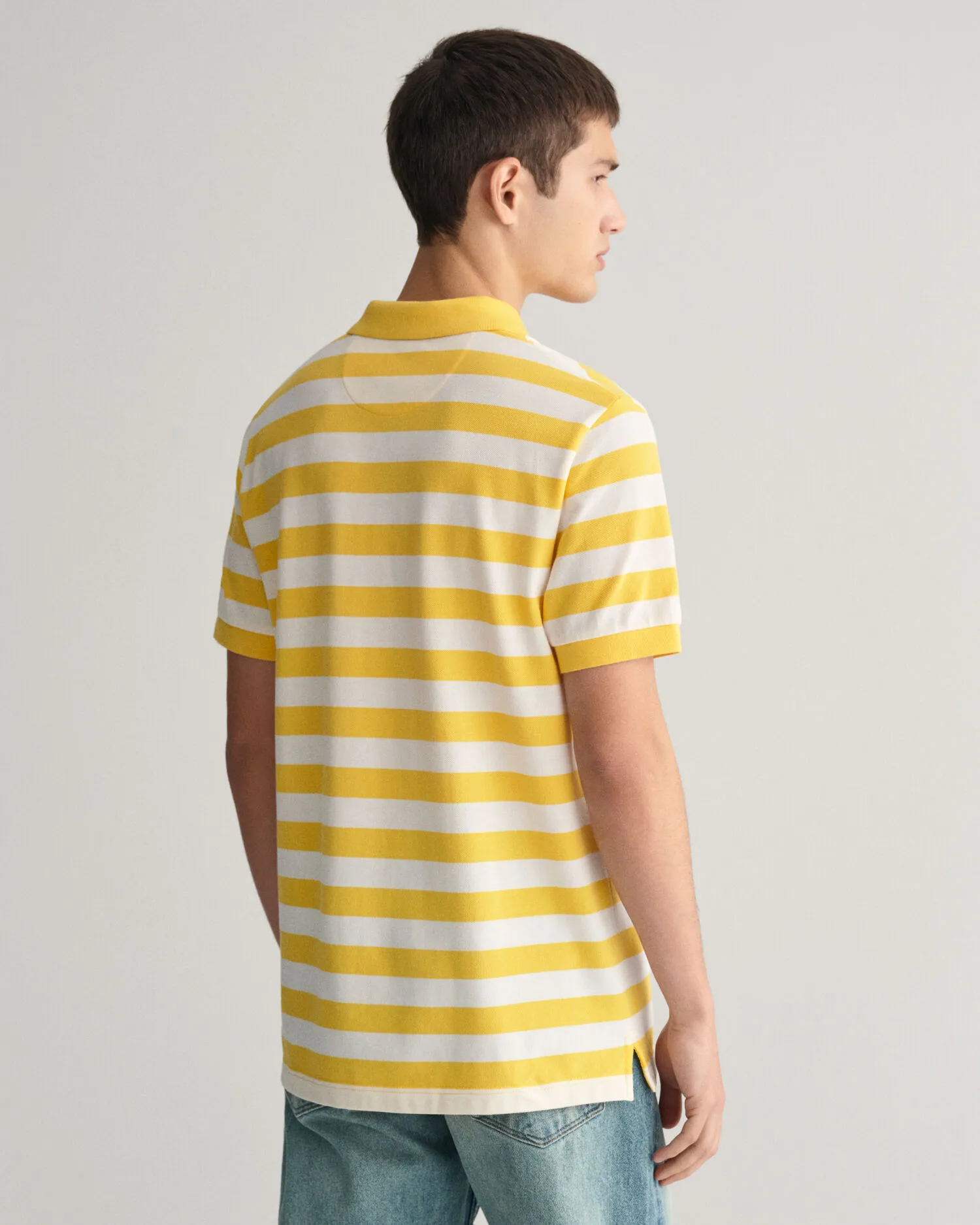 Polo de piqué a rayas anchas